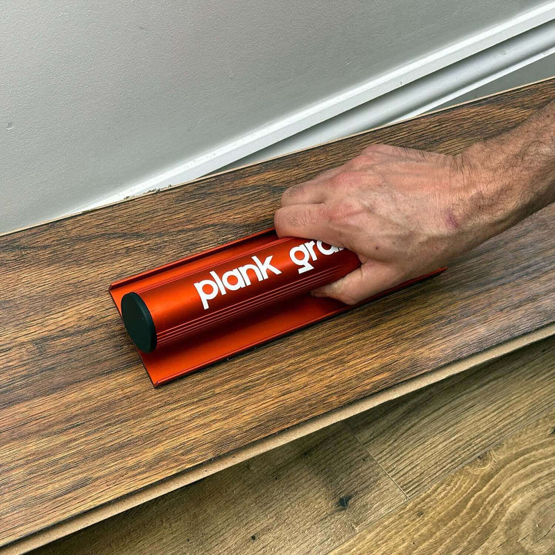 Cargue la imagen en el visor de la galería, Floor Fix Pro Plank Grabber Plank Grabber is a tool for fixing gaps in floating floors. It features a &quot;Magic Grip Strip&quot; that sticks to the plank you want to move using nano-suction and without leaving any sticky residue. Plank Grabber can be used to fix
