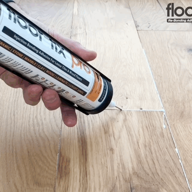 Laden Sie das Bild in Galerie -Viewer, Floor Fix Pro Floor-Fix Pro 300ml -Fix Loose Tiles &amp; Hollow Wood Floors Floor-Fix Pro is a super strength, low viscosity bonding adhesive for repairing loose or hollow tiles and creaky wood floors. To fix loose tiles simply drill a hole in the grout lines
